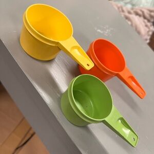 Vintage Tupperware brand plastic measuring cups stackable